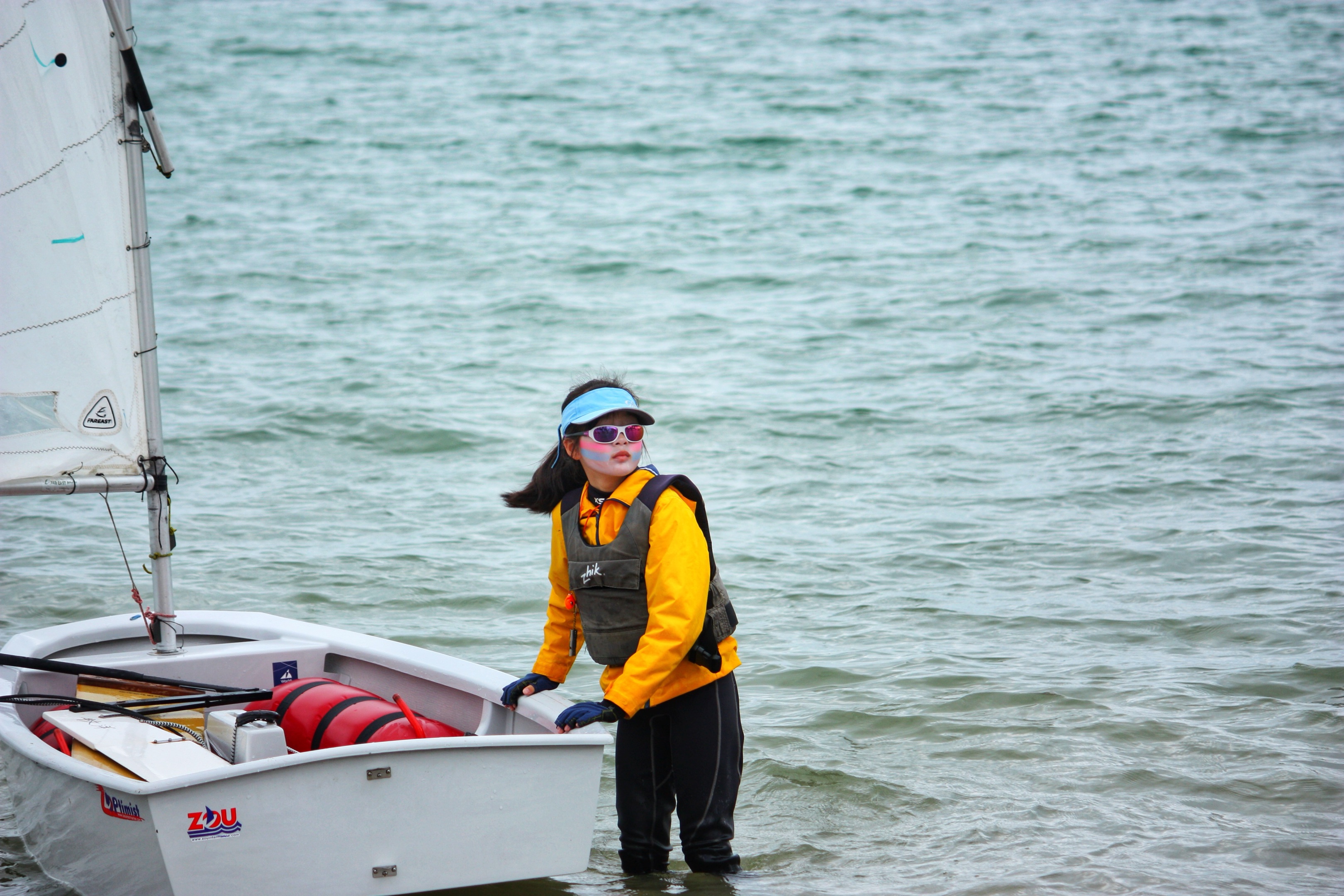Joanne sailing Optimist
